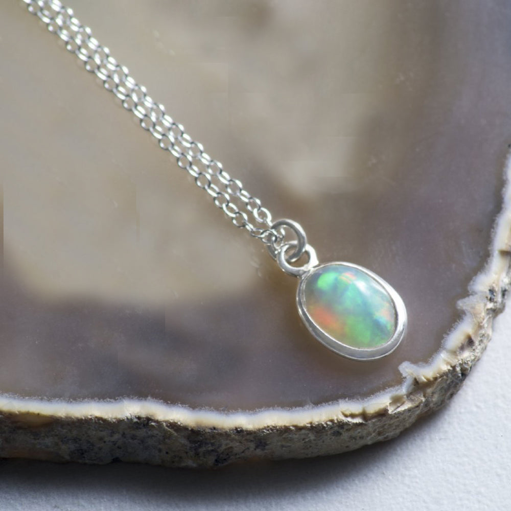 
            
                Load image into Gallery viewer, Welo Opal Sterling Silver October Birthstone Necklace
            
        