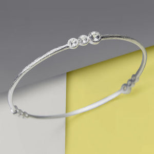 
            
                Load image into Gallery viewer, White Topaz Sterling Silver November Birthstone Bangle
            
        