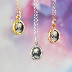 
            
                Load image into Gallery viewer, Gold And Silver Cherub Oval Necklace
            
        