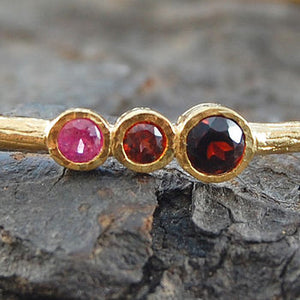 
            
                Load image into Gallery viewer, Silver Garnet And Ruby Triple Stone Bangle
            
        