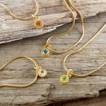 
            
                Load image into Gallery viewer, Assorted Charm Gold Birthstone Bracelet
            
        