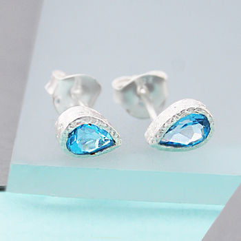 Silver And Blue Topaz Tear Drop Stud Earrings