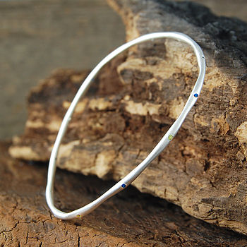 
            
                Load image into Gallery viewer, Sapphire Birthstone Silver Stacking Bangle
            
        