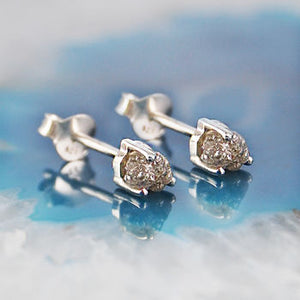 
            
                Load image into Gallery viewer, Tiny Silver Raw Diamond Birthstone Stud Earrings
            
        