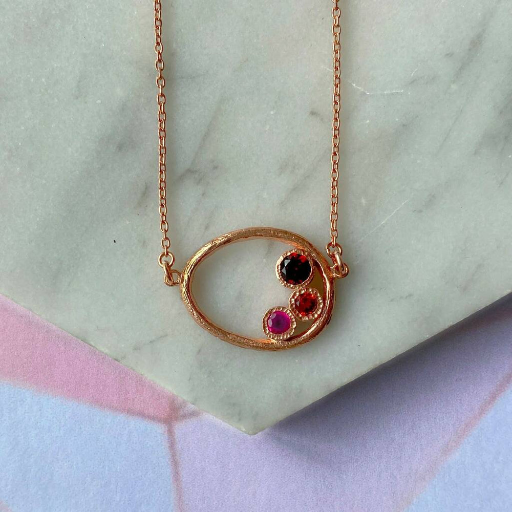 Rose Gold Garnet And Ruby Oval Necklace